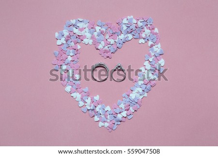   Colorful sprinkles on pink background
