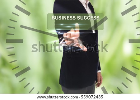 business, technology, internet and networking concept - businessman business success button on virtual screens, blurred of green nature outdoor bokeh background
