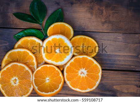 Orange on wooden background , selective focus and still life.