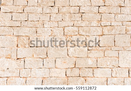 Rustic gray stone wall.
