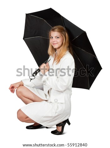 Pretty girl in cloak with umbrella. Isolated over white