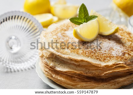 English-style pancakes with lemon and sugar, traditional for Shrove Tuesday
 Royalty-Free Stock Photo #559147879