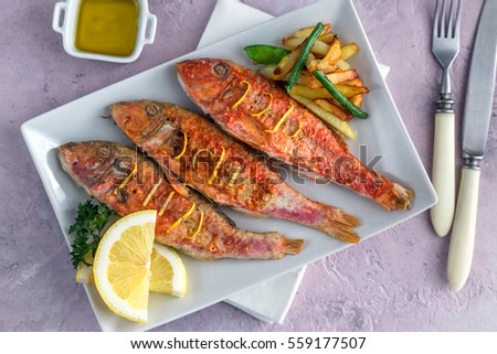 Fried Red Mullet or Turkish Barbunya on Plate, top view