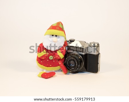 a photographer and an old camera
