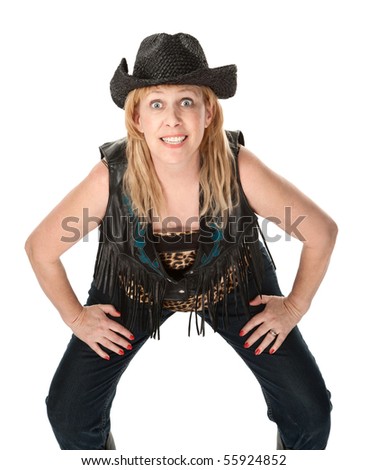 Middle-aged woman in biker outfit posing for a picture