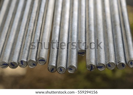 Close up of steel rod plated with zinc.