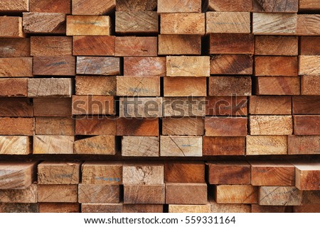 Wood timber in the sawmill. Royalty-Free Stock Photo #559331164