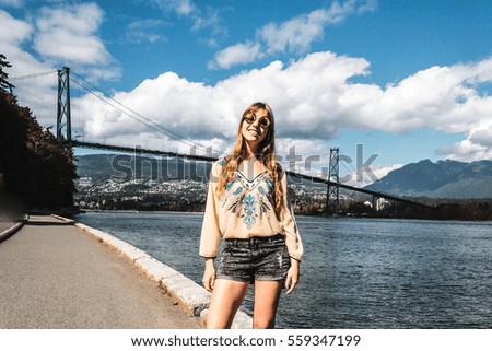 Photo of Girl at Lions Gate Bridge in Vancouver, BC, Canada