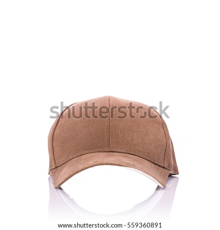 Close up new brown baseball hat. Studio shot isolated on white background