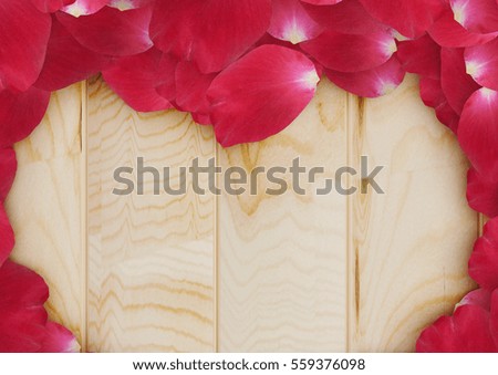 Red roses with heart on wooden background, valentines day