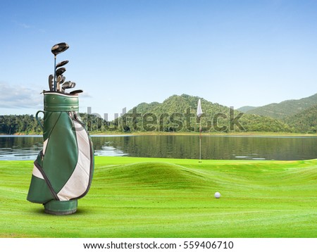 golf equipment and golf ball on green .