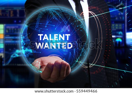 Business, Technology, Internet and network concept. Young businessman working in the field of the future, he sees the inscription: talent wanted 