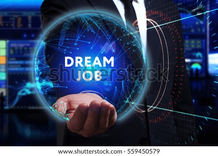 Business, Technology, Internet and network concept. Young businessman working in the field of the future, he sees the inscription: dream job 
