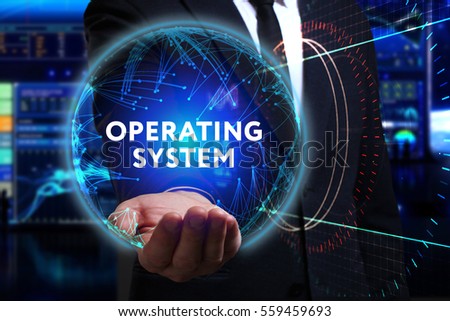 Business, Technology, Internet and network concept. Young businessman working in the field of the future, he sees the inscription: operating system  Royalty-Free Stock Photo #559459693