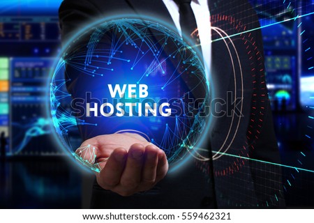 Business, Technology, Internet and network concept. Young businessman working in the field of the future, he sees the inscription: web hosting 