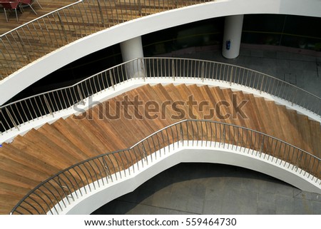 Modern architecture water front harbour shopping mall in South East Asia city Singapore curves and angles                               