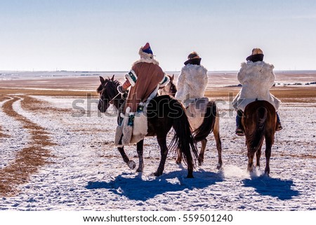 Horse Racing on the Grassland Royalty-Free Stock Photo #559501240