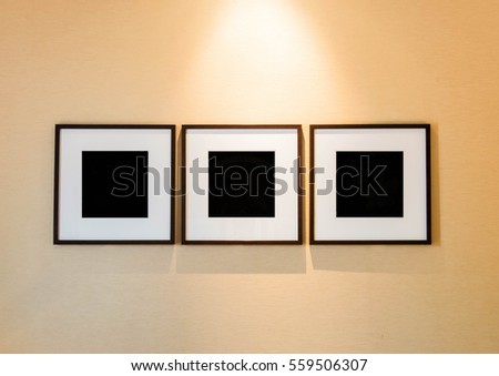 Blank picture frames on the wall room
