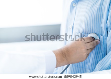Doctors are listening to heart sounds. Royalty-Free Stock Photo #559543945