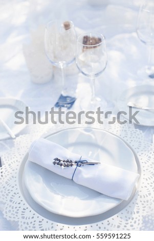 Sprig of lavender on a white plate, table decoration