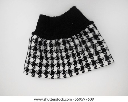 Black and white Children's skirt. Needlework. Knitting.