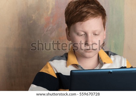 Child with a tablet pc