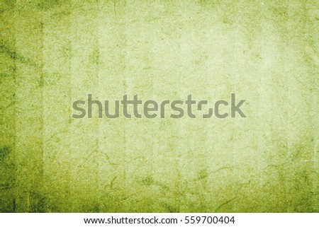 Green natural paper texture background Royalty-Free Stock Photo #559700404