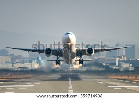 Airplane taking off from the airport. Royalty-Free Stock Photo #559714906