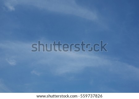 Clear blue sky with light cloud