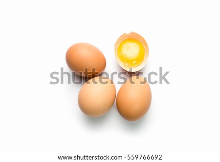 egg on white background with egg is broken Royalty-Free Stock Photo #559766692