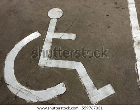A special parking sign reserved for disability person.