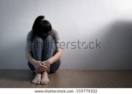 The depression woman sit on the floor Royalty-Free Stock Photo #559779202