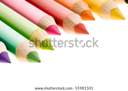 Collection of colorful pens over white background