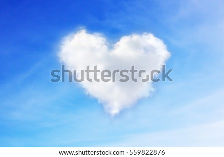 blue sky with hearts shape clouds. Valentine's holiday background