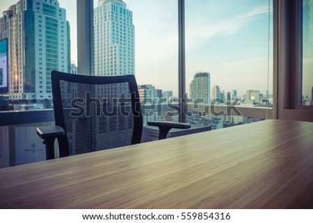blurred background of city and desk