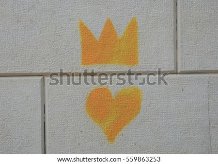 Streat art heart with crown in the city of Lisbon Portugal