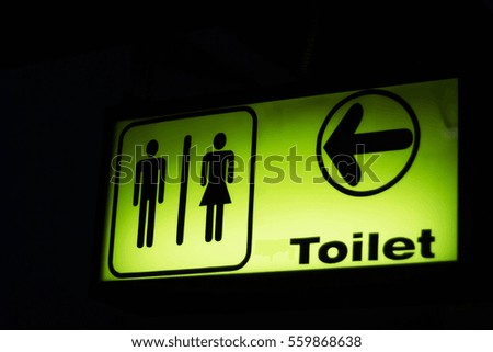 Toilet sign in cinema.