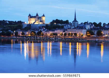 Panorama of Saumur at night. Saumur, Pays de la Loire, France Royalty-Free Stock Photo #559869871