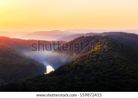 The Saar is a river in northeastern France and western Germany, and a right tributary of the Moselle. Royalty-Free Stock Photo #559872415