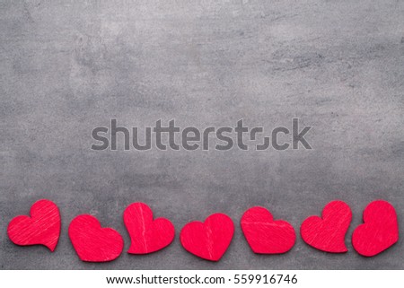 Red heart on the gray background.