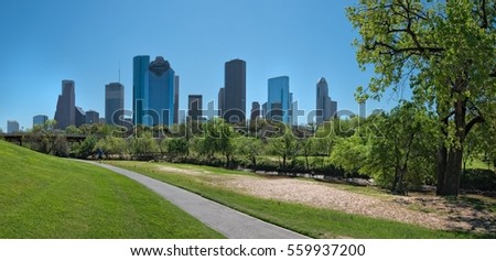 Houston Texas skyline from Woodland Park with the treelined river