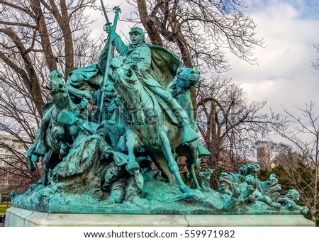 Cavalry men charge into battle on the Civil War Memorial in Washington D.C. Royalty-Free Stock Photo #559971982