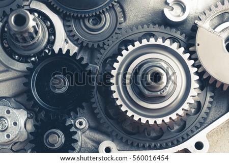 engine gears wheels, closeup view Royalty-Free Stock Photo #560016454