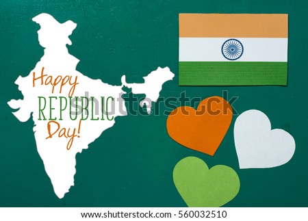 Happy Indian Republic Day 26 January concept. India flag (heart color) hanging on pegs ( clothespin ) with text Vande Mataram in national tricolour flag and ashoka. Toned image