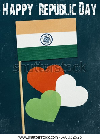 Happy Indian Republic Day 26 January concept. India flag (heart color) hanging on pegs ( clothespin ) with text Vande Mataram in national tricolour flag and ashoka. Toned image