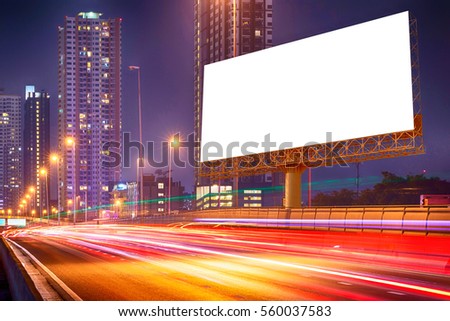 Right blank billboard on light trails, street and urban in the night - can advertisement for display or montage product or business.