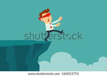 blindfolded businessman walk to the cliff. Business concept Royalty-Free Stock Photo #560053792