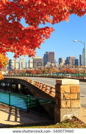 View of the Boston skyline from Cambridge Memorial Drive. Cityscape concept. Autumn colors skyline. Vertical