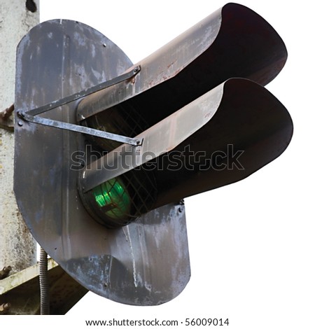 Old rusted grunge railroad green light signal, isolated macro closeup