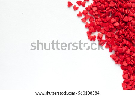 Valentine day background with red hearts, top view Royalty-Free Stock Photo #560108584